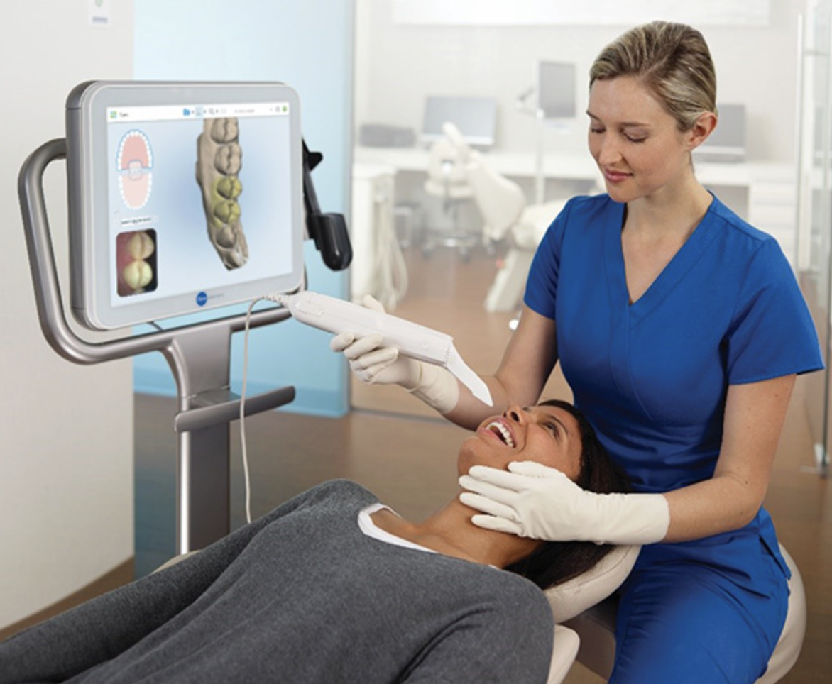 Digital intraoral scanner creating a comfortable, mess-free 3D scan of a patient's teeth for crowns, Invisalign, implants, and restorative dentistry at Jeffrey L. Cohen, DDS in Covina, CA.